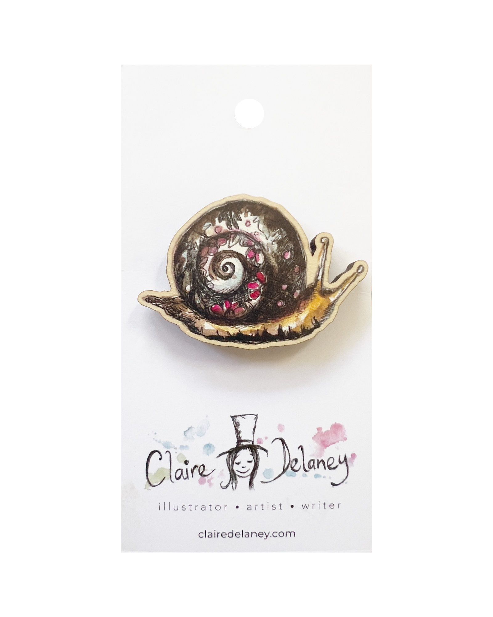 Snail Wooden Pin Badge featuring Claire Delaney artwork on its display card